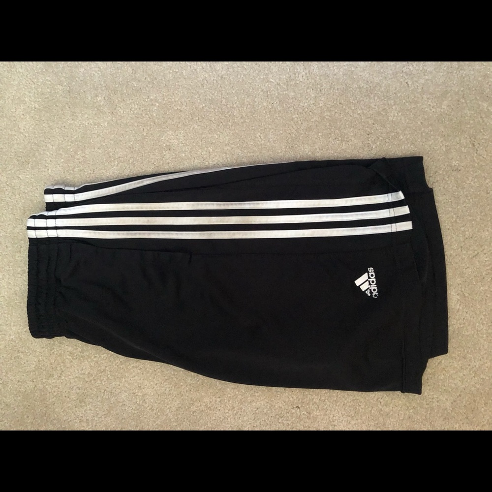 Black adidas shorts.